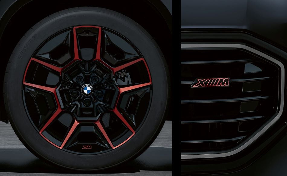 Detailed images of exclusive 22” M Wheels with red accents and XM badging on Illuminated Kidney Grille. in BMW of Grand Blanc | Grand Blanc MI